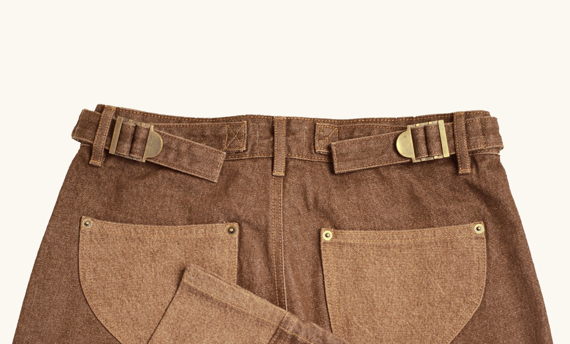 Slide-buckle waist adjuster on the Centenarian Functional Jeans