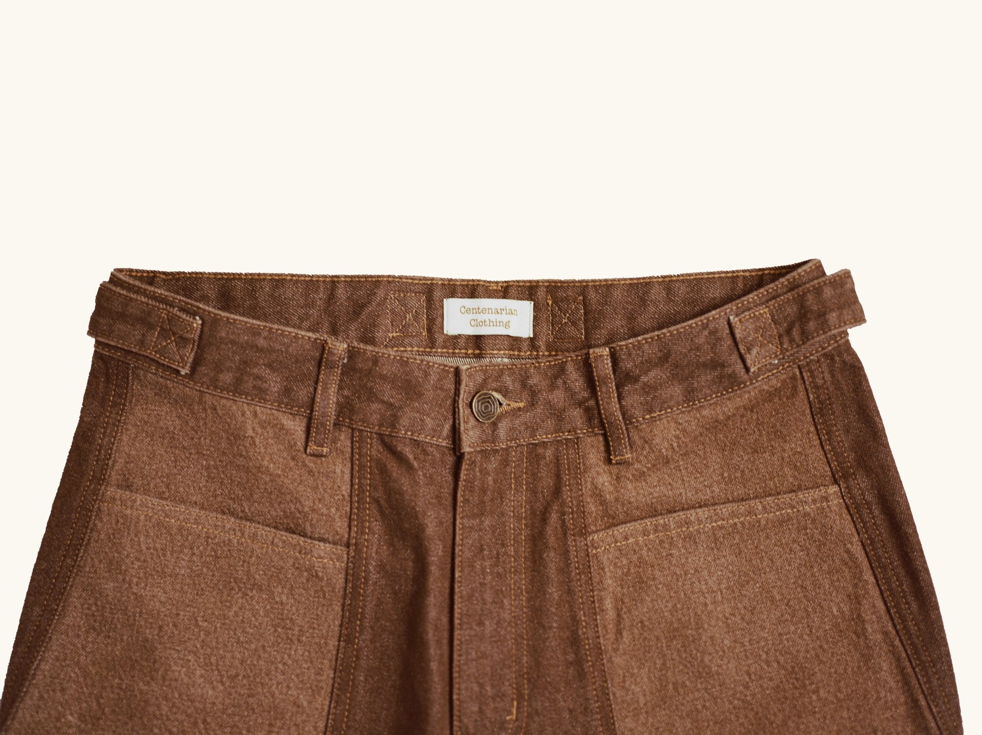 Front waistband with button and slide-buckle tabs